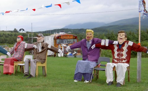 Scarecrows by the bus.